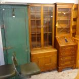 A 1930s oak 2-section bookcase, W76cm, H188cm, D47cm