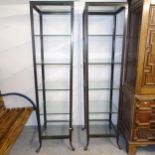 A pair of metal-framed open shelves of tapered form, W45cm, H157cm