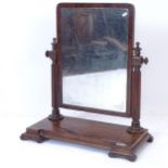 A Regency mahogany swing toilet mirror, W67cm, H73cm