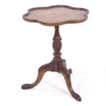 A reproduction wine table with shaped top, carved centre column and tripod base, W50cm, H60cm