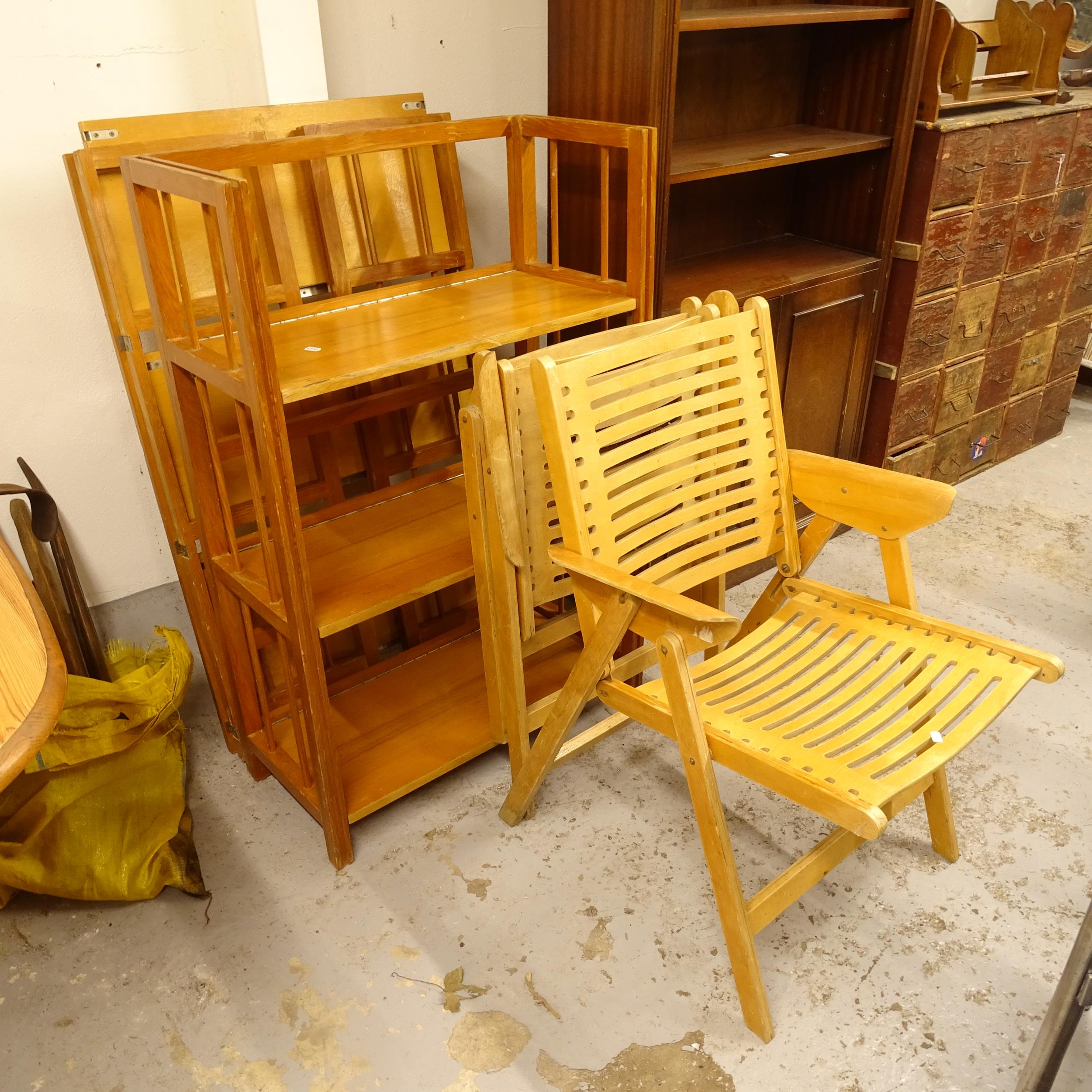 A pair of 3-tier folding display shelves, and a pair of folding chairs