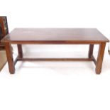 A large hardwood refectory table, with 2 end leaves, L199cm extending to 301cm, H77cm, D91cm