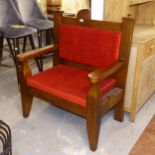 An oversized upholstered pub armchair, W90cm, H106cm