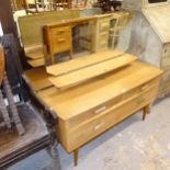 A pair of mid-century oak veneered dressing tables, W117cm, H110cm, D40cm