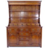 A reproduction oak Welsh dresser, W153cm, H198cm, D53cm