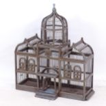 A large painted wooden birdcage with dome top, W70cm, 82cm, D33cm