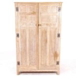 A Heals style limed oak 2-door gentleman's wardrobe, W95cm, H153cm, D48cm