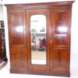 A Victorian mahogany and satinwood-banded 3-door compactum wardrobe, W197cm, H212cm, D60cm