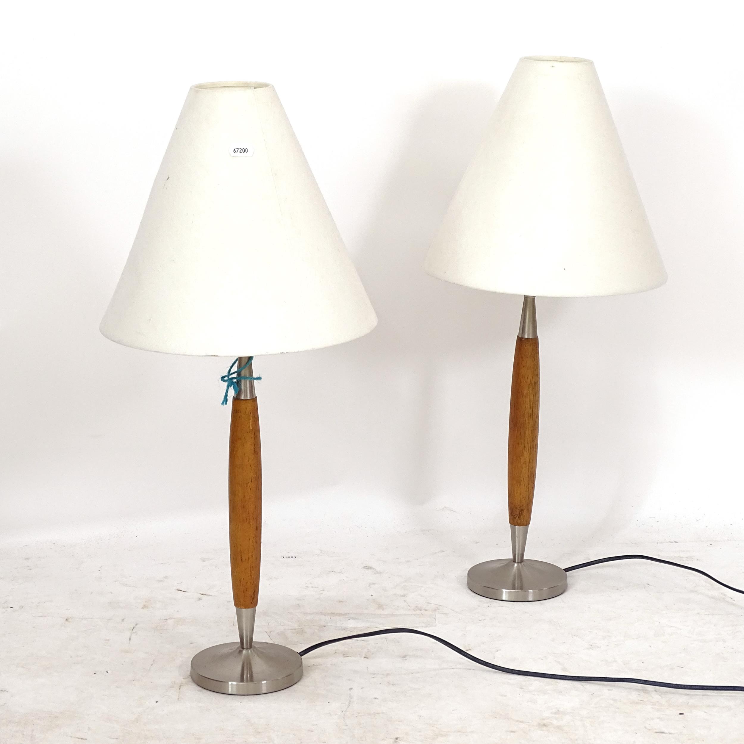 A pair of mid-century style table lamps, height including shade 66cm