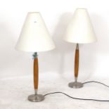 A pair of mid-century style table lamps, height including shade 66cm