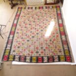 A cream ground Kilim carpet, 284cm x 233cm