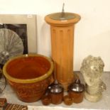 A pair of treacle glazed bird feeders, a terracotta sundial, H72cm, a weathered concrete bust, and a