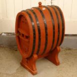 A painted coopered oak barrel on stand, converted to a drinks cabinet, W54cm, H90cm