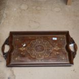 A hardwood tea tray with inlaid brass decoration, length 69cm