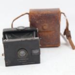 A Vintage Stereoscopic Co Vesca folding strut camera, with green leather cover and Negretti & Zambra