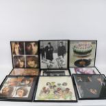A quantity of framed LP record cover reprints