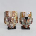 A pair of Mexican hardstone mask sculptures, height 22cm (1 repaired)