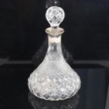 A late 20th century silver-mounted glass ship's decanter and stopper, hallmarks London 1973,