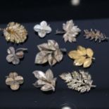 FLORA DANICA - a selection of 10 silver-gilt brooches, some by Flora Danica