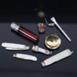 A small silver-gilt snuff pot, a small silver cigar cutter, fruit knives, scent bottle etc