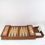 A Franklin Mint Excalibur back gammon set, with drawer under with pieces