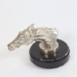 A Vintage silver plated racehorse car mascot, on magnetic base