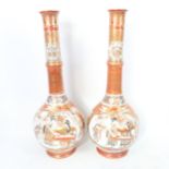 A large pair of Japanese Imari style narrow-neck vases, figural and floral decoration, with marks on