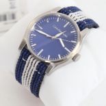 A new Calvin Klein quartz wristwatch, with blue dial and woven strap, original box