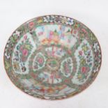 A Chinese Canton famille rose punch bowl, allover figural and bird decoration, diameter 30cm Rim has