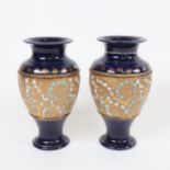 A pair of Royal Doulton stoneware baluster vases, model no. 7078, height 15cm