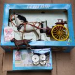 A boxed Sindy Gig and Horse, and a Sindy pram