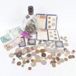 Various British and world coins, including a quantity of sixpence pieces