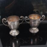 An Edward VIII 2-handled silver golfing trophy, presented to The John Laird & Son Ltd Golf Club, and