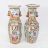 A pair of Chinese Canton famille rose porcelain vases with figure decorated panels, both A/F, height
