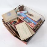 A boxful of postcards and ephemera