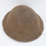 A Second World War Period British Army steel Brodie helmet