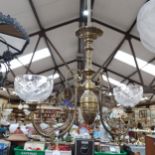 A Regency style brass twin-branch chandelier, with glass shades, overall height approx 90cm, overall