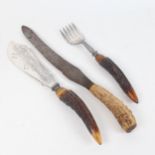 A horn-handled fish slice and fork, and a similar carving knife