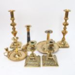 Various brass candlesticks, including chamber sticks, and Victorian examples
