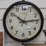 An early 20th century Smiths Sectric Bakelite dial wall clock, overall diameter 37cm