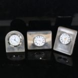 2 Kitney & Company silver-fronted mantel/travel clocks, and another (3)
