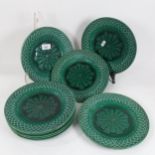 A set of 9 Victorian Minton green Majolica plates, 23cm