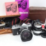 A Vintage Nikon F 35mm single lens reflex camera, and 2 cases of Nikon accessories and lenses