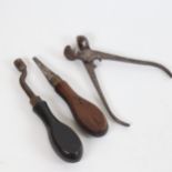 Various Antique tools, including nipple wrench, screwdriver, and bullet mould set for pistol (3)