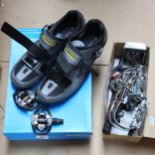 A pair of Shimano gent's cycling shoes, size 48, together with guards and puncture kit