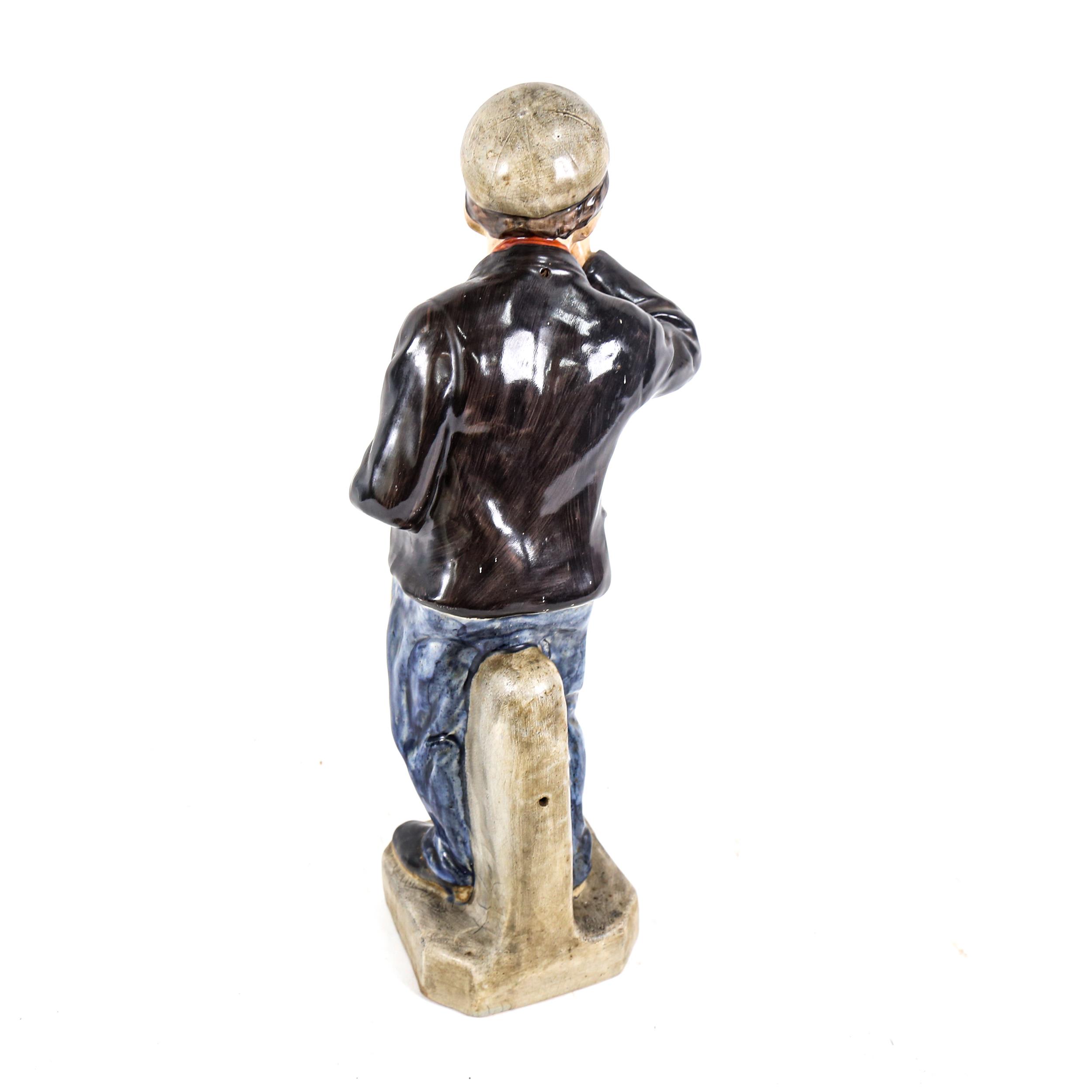 A large ceramic Greenlees Claymore Favourite Scotch advertising figure, modelled as a newspaper boy, - Image 2 of 2