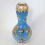 A Japanese hand painted and gilded ceramic Satsuma garlic-neck butterfly vase, height 24cm No