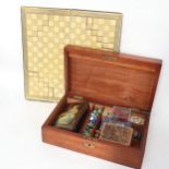 A Victorian mahogany box, containing playing cards, dominos etc, width 33cm