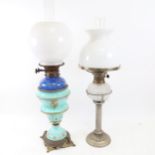 An Antique brass oil lamp with cut-glass font, and another oil lamp with painted decoration, both