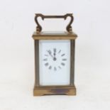 A brass-cased carriage clock, height 14.5cm